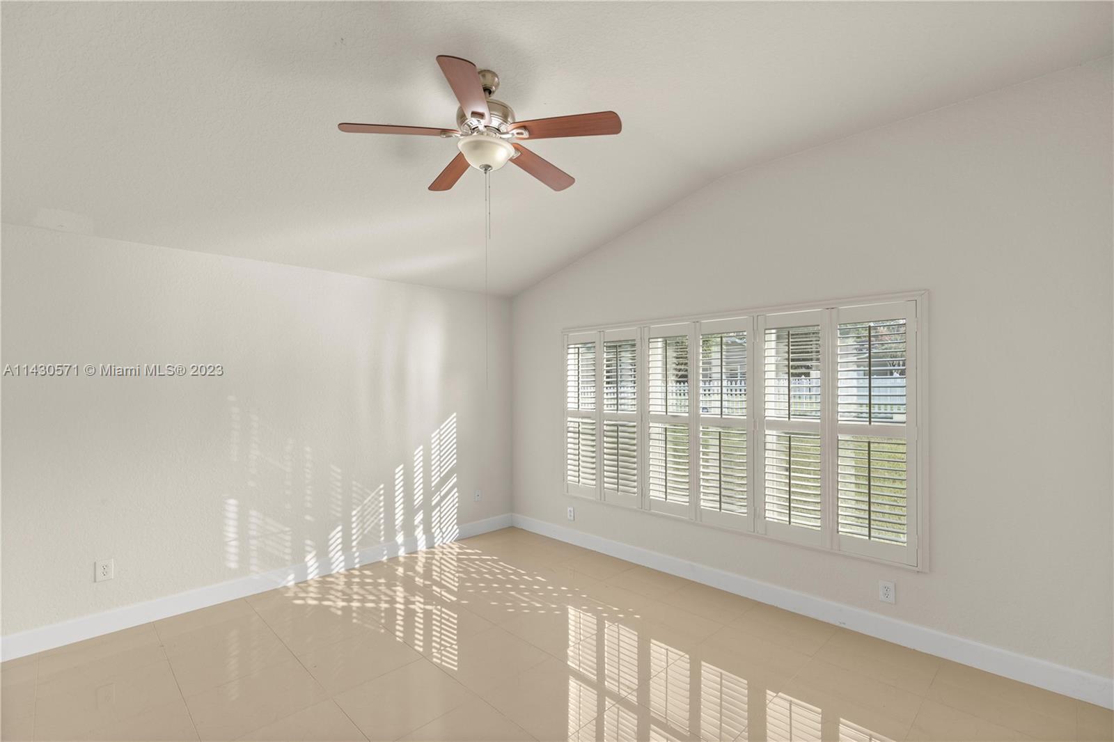 5453 Southwest 40th Street Ocala, FL 34474 - Photo 12 of 40 a view of an empty room with a window