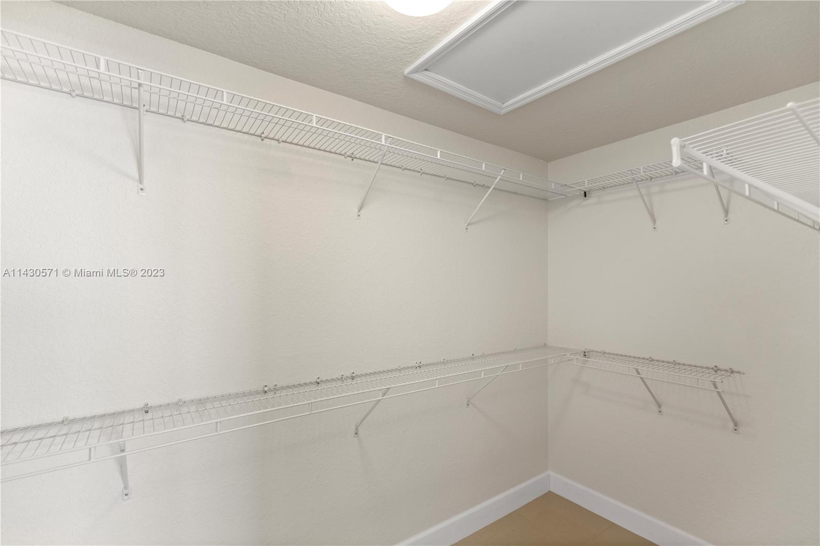 5453 Southwest 40th Street Ocala, FL 34474 - Photo 19 of 40 a view of a room with racks on the wall