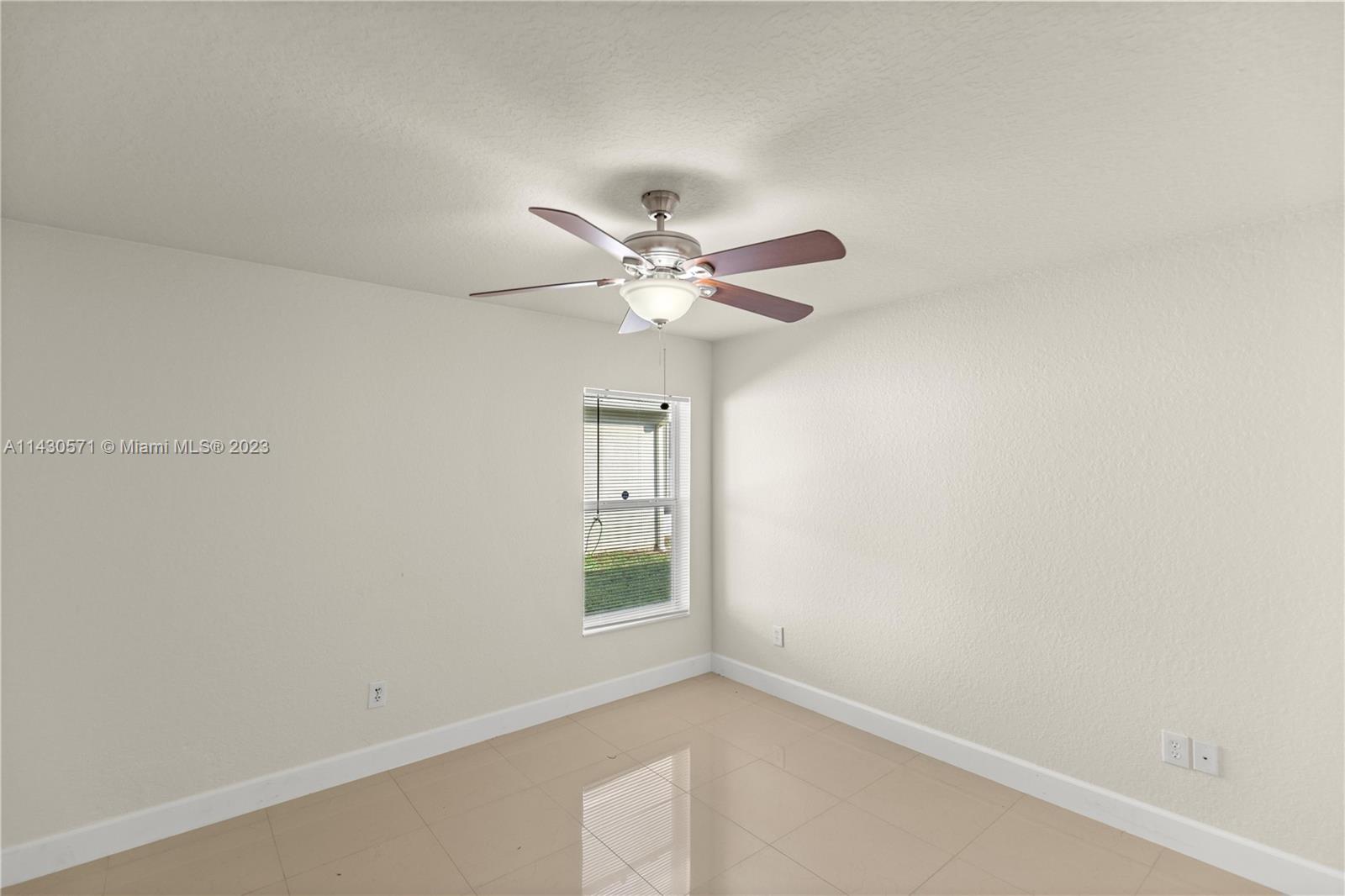 5453 Southwest 40th Street Ocala, FL 34474 - Photo 20 of 40 an view of an empty room with a window