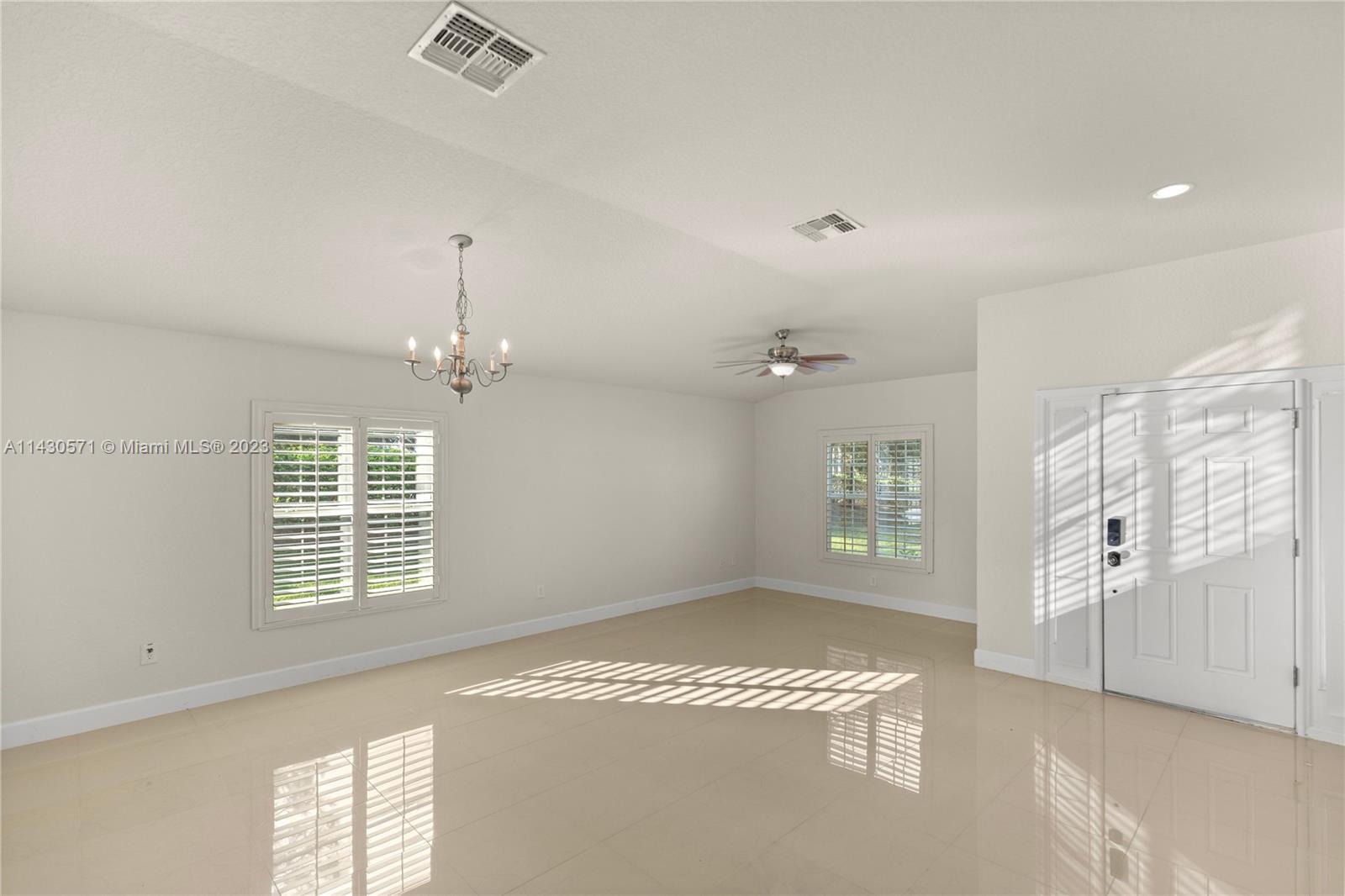 5453 Southwest 40th Street Ocala, FL 34474 - Photo 2 of 40 a view of an empty room with a window