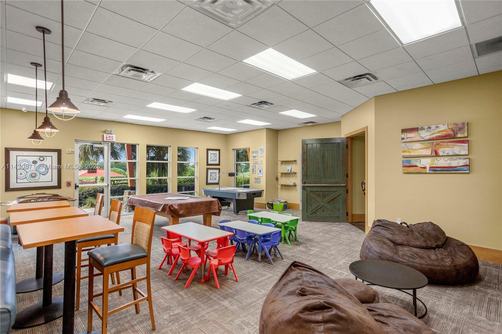 5453 Southwest 40th Street Ocala, FL 34474 - Photo 37 of 40 a living room with furniture and a large window
