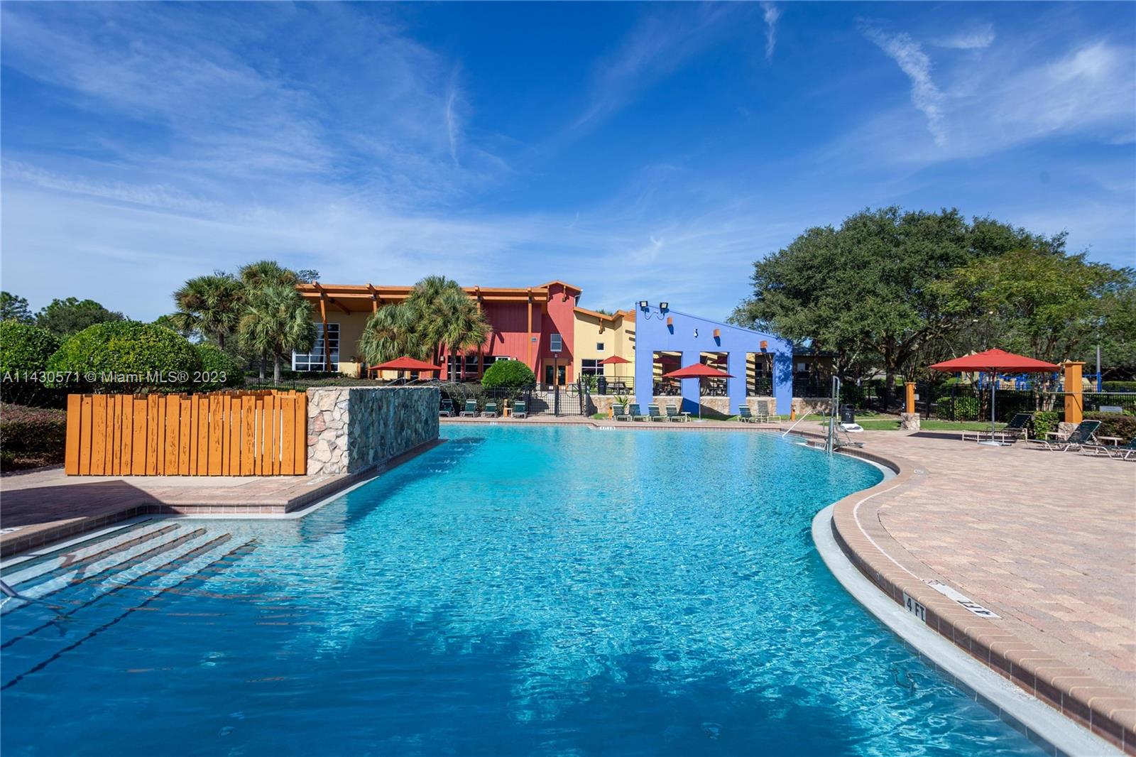 5453 Southwest 40th Street Ocala, FL 34474 - Photo 39 of 40 a view of a house with a swimming pool