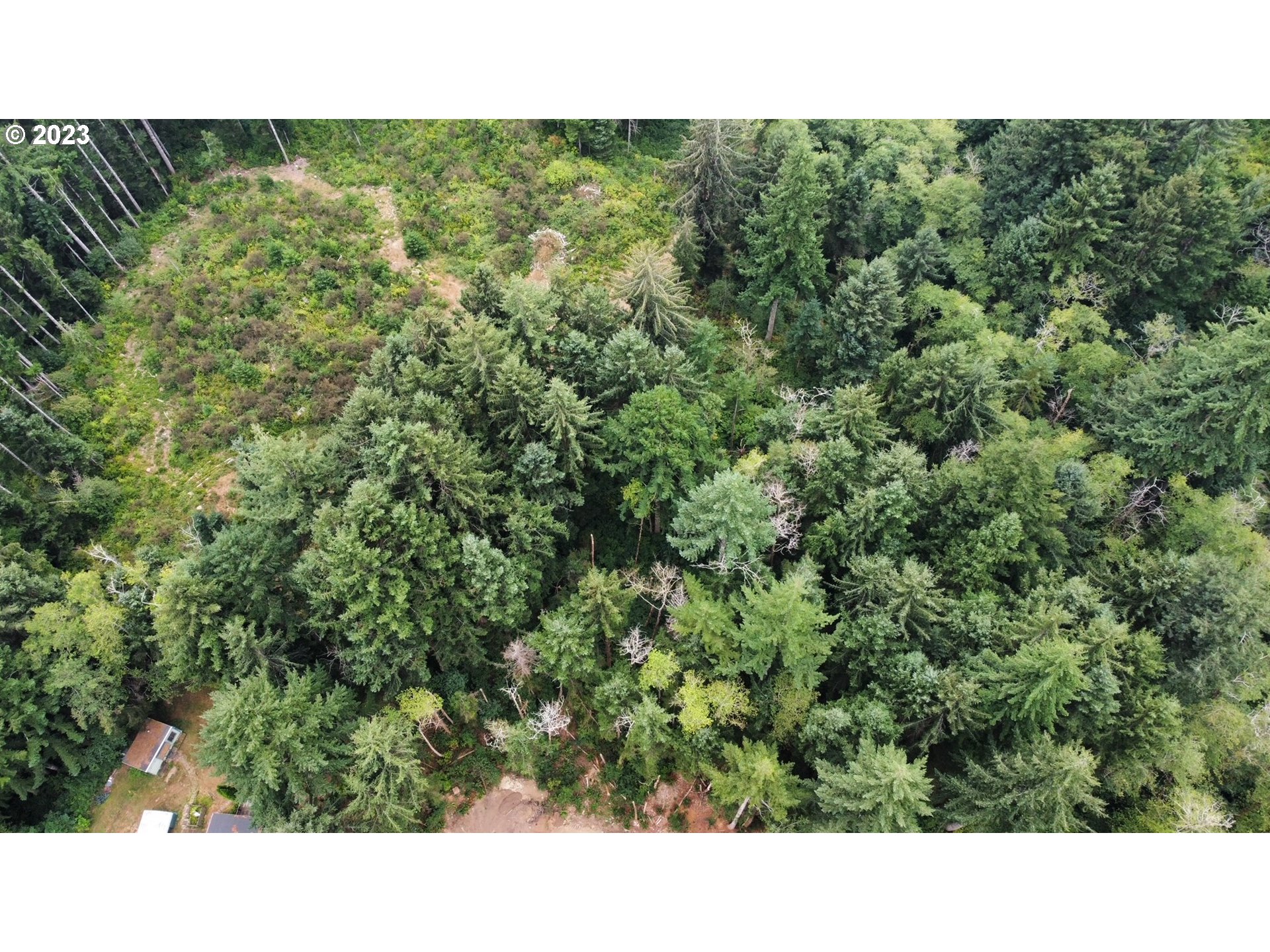 Erhart Road Florence, OR 97439 - Photo 11 of 11 a black and white photo of a house
