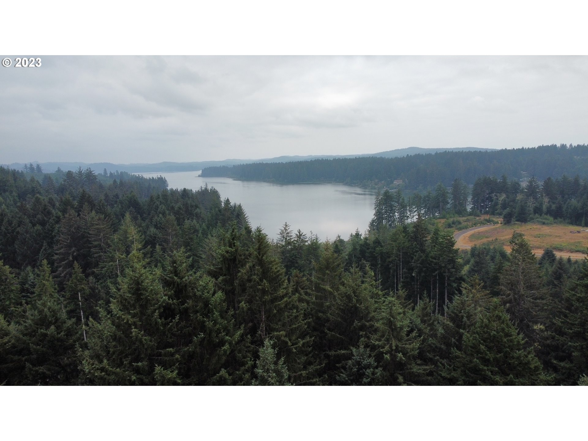 Erhart Road Florence, OR 97439 - Photo 8 of 11 a black and white photo of a house