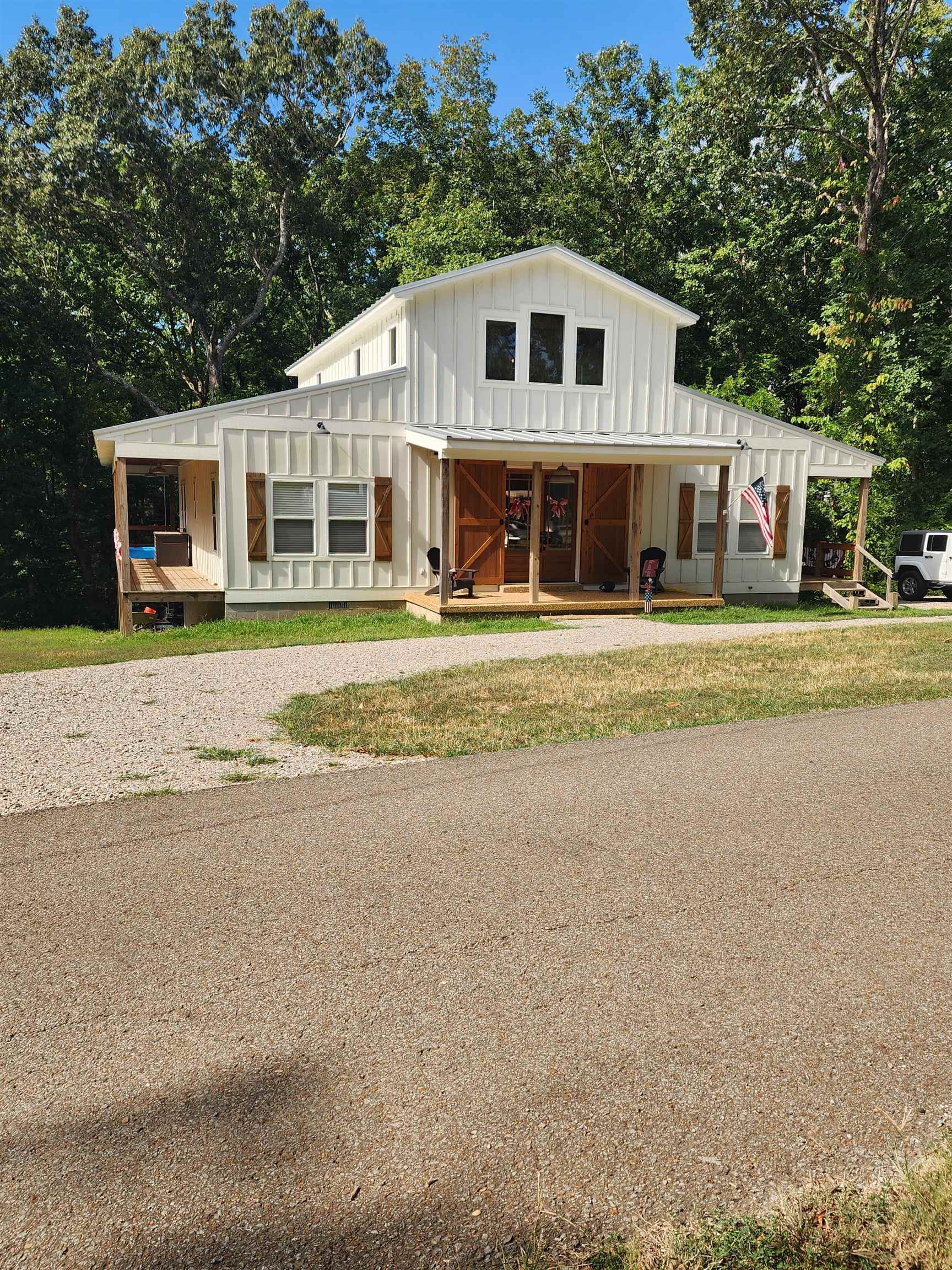 540 Muscatel Lane Counce, TN 38326 - Photo 1 of 35 a front view of a house with a garden