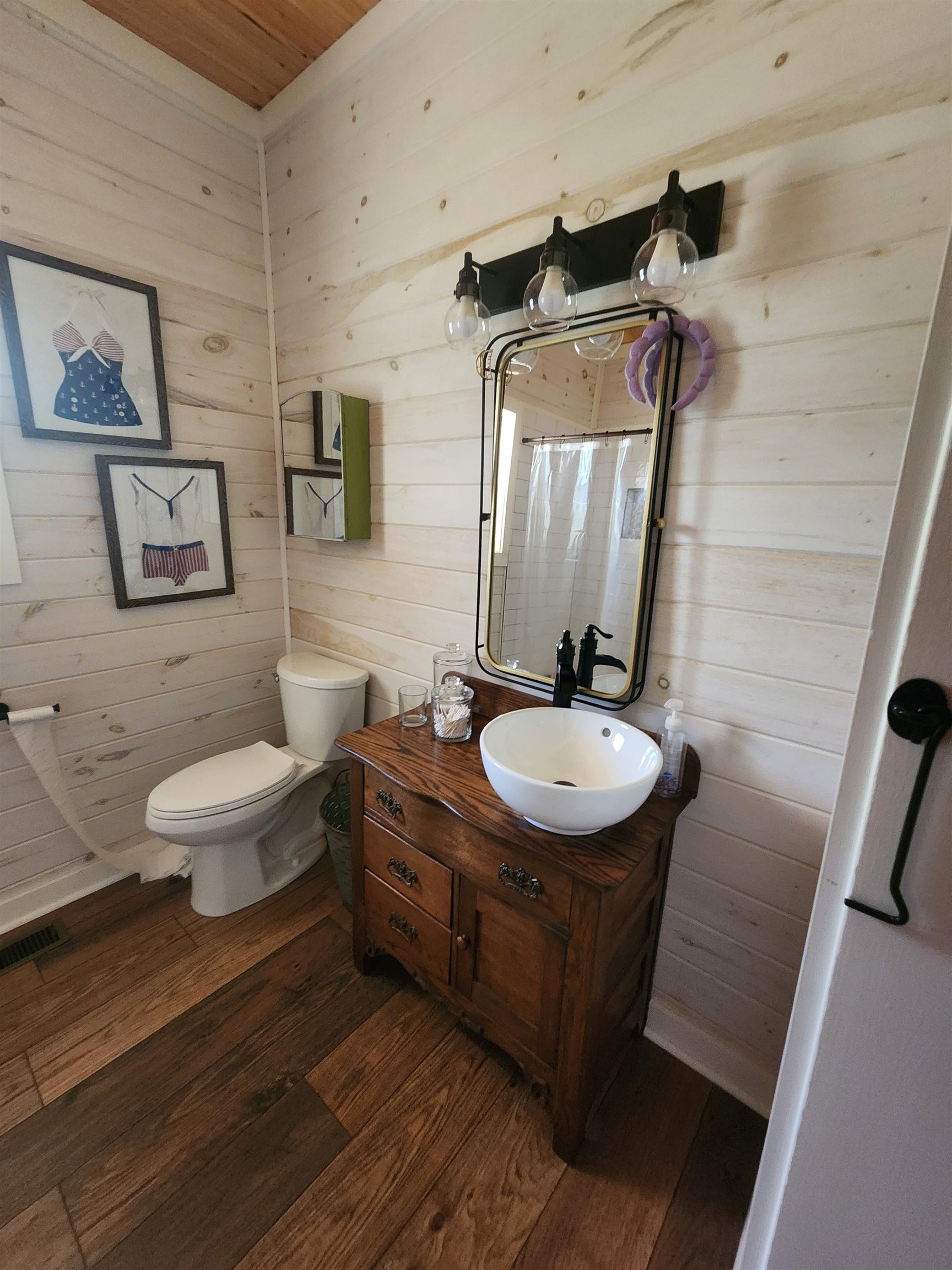 540 Muscatel Lane Counce, TN 38326 - Photo 23 of 35 a bathroom with a granite countertop sink toilet a mirror and shower