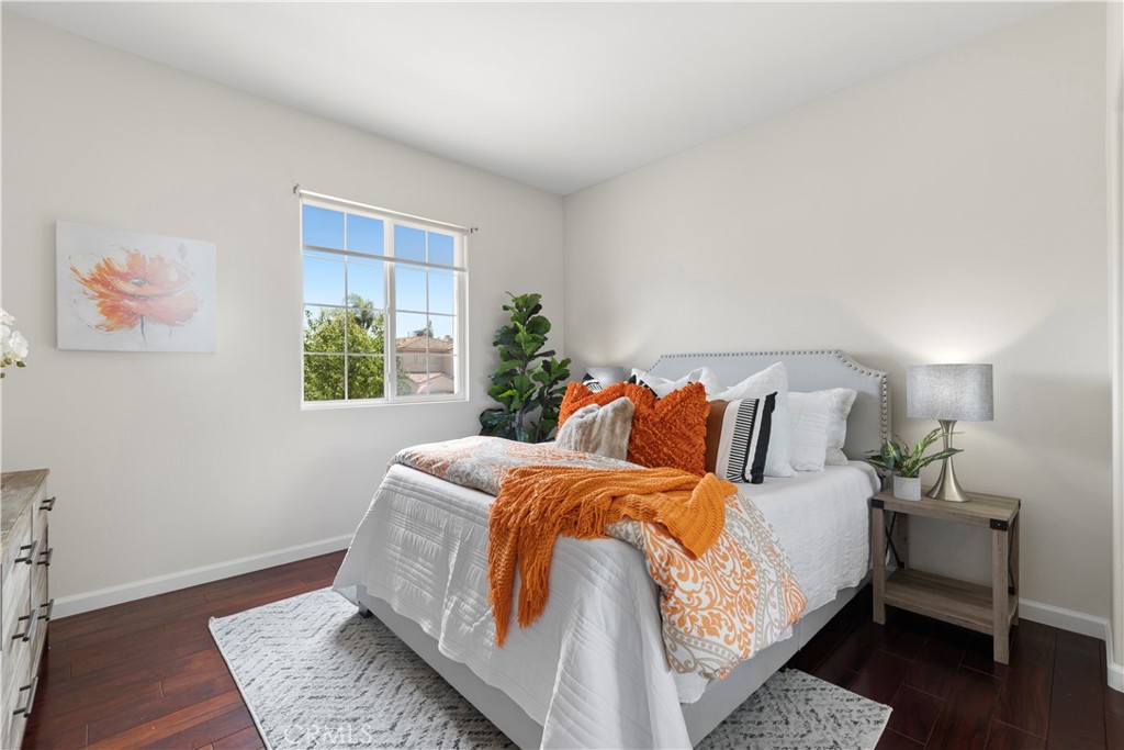 68 Via Sonrisa San Clemente, CA 92673 - Photo 16 of 25 a bed sitting in a bedroom next to a window