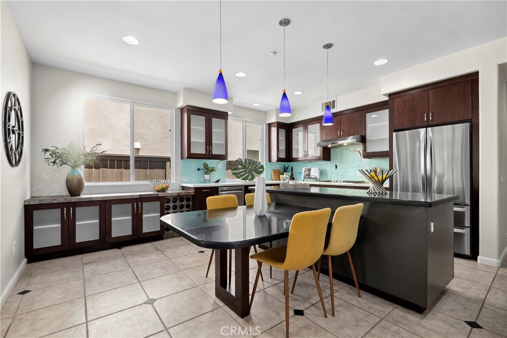 68 Via Sonrisa San Clemente, CA 92673 - Photo 8 of 25 a kitchen with stainless steel appliances granite countertop a stove a sink and a refrigerator