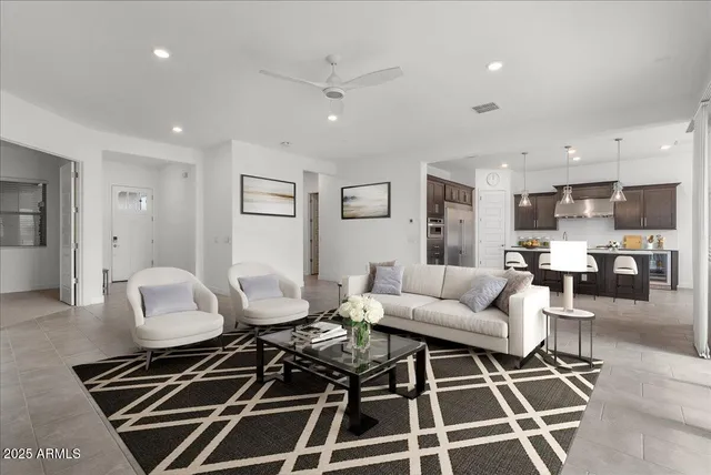 a spacious bathroom with a sink vanity and a mirror