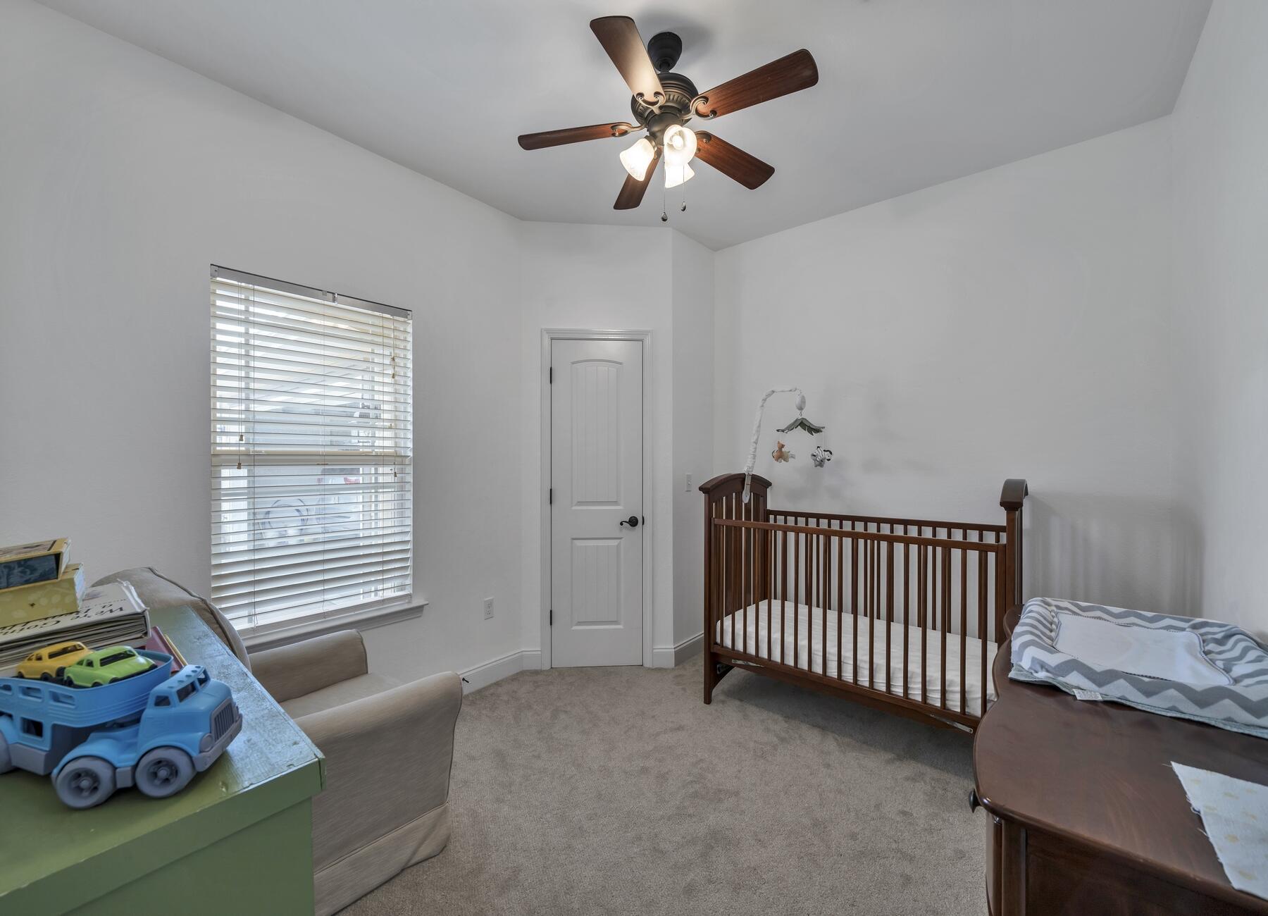 4413 Mirada Way Crestview, FL 32539 - Photo 18 of 30 a bedroom with furniture and a window