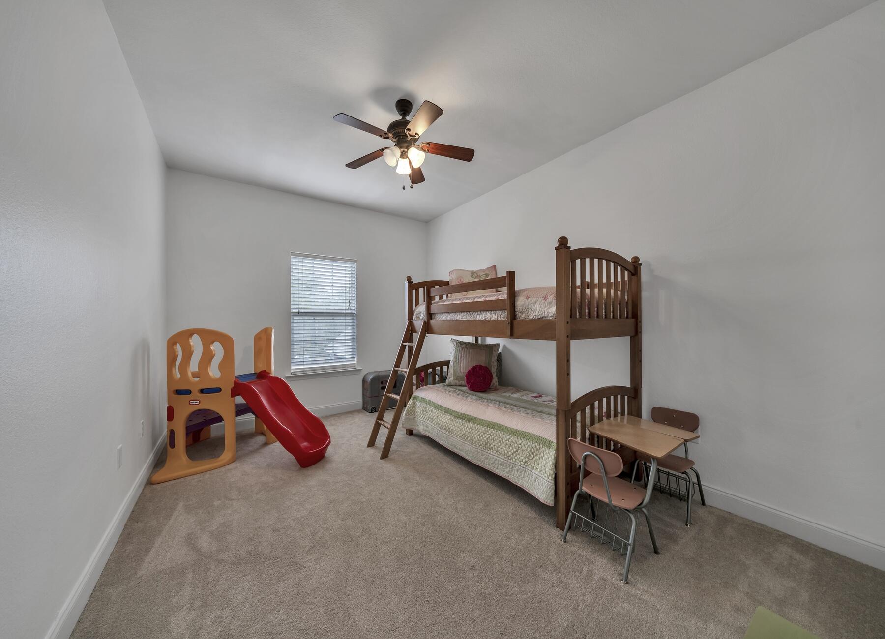 4413 Mirada Way Crestview, FL 32539 - Photo 23 of 30 a bedroom with a bed and white walls