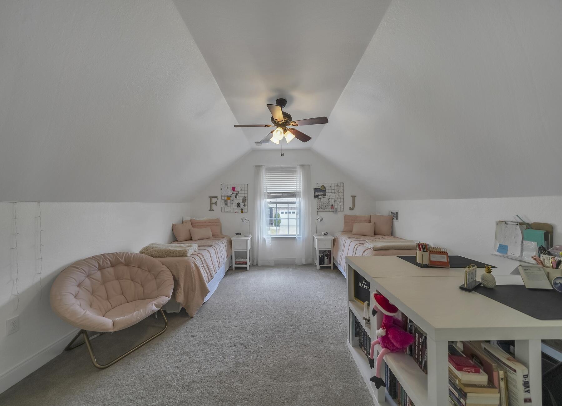 4413 Mirada Way Crestview, FL 32539 - Photo 26 of 30 a bedroom with furniture and a chandelier