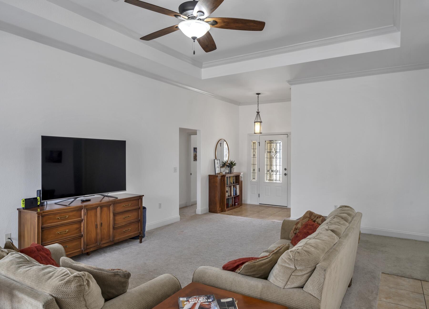 4413 Mirada Way Crestview, FL 32539 - Photo 5 of 30 a living room with furniture and a flat screen tv