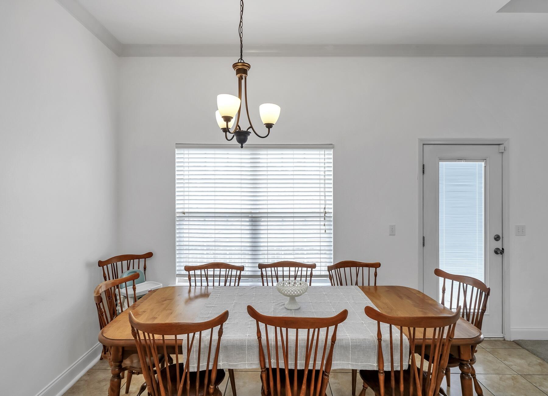 4413 Mirada Way Crestview, FL 32539 - Photo 10 of 30 a dining room with furniture and window