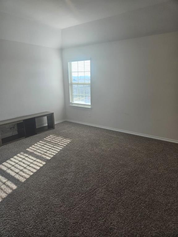 1520 Dilley Lane Forney, TX 75126 - Photo 12 of 26 an empty room with a window