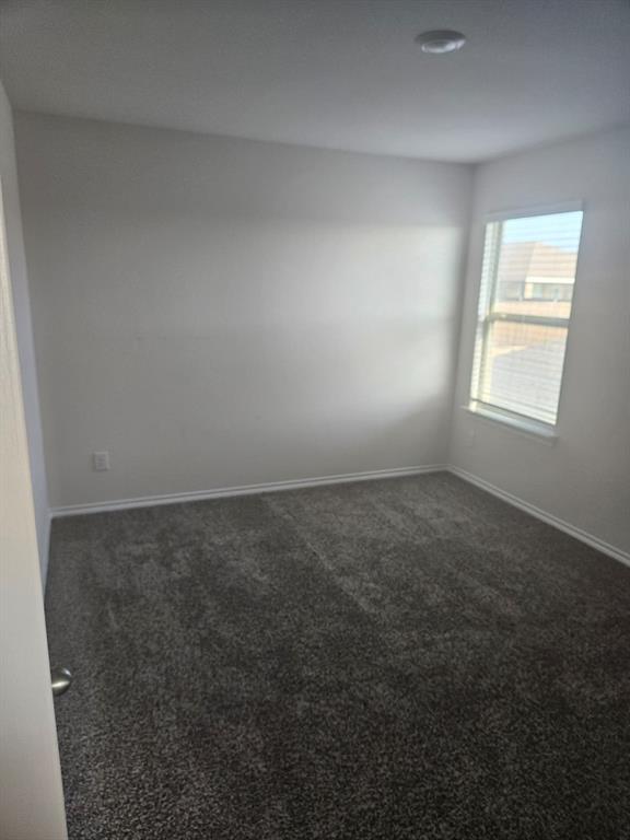 1520 Dilley Lane Forney, TX 75126 - Photo 15 of 26 an empty room with a window