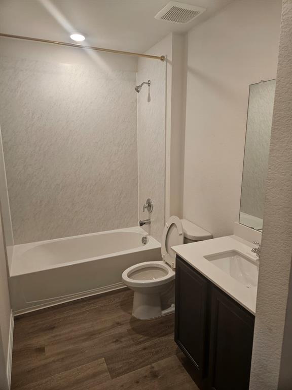 1520 Dilley Lane Forney, TX 75126 - Photo 17 of 26 a bathroom with a sink a toilet and shower