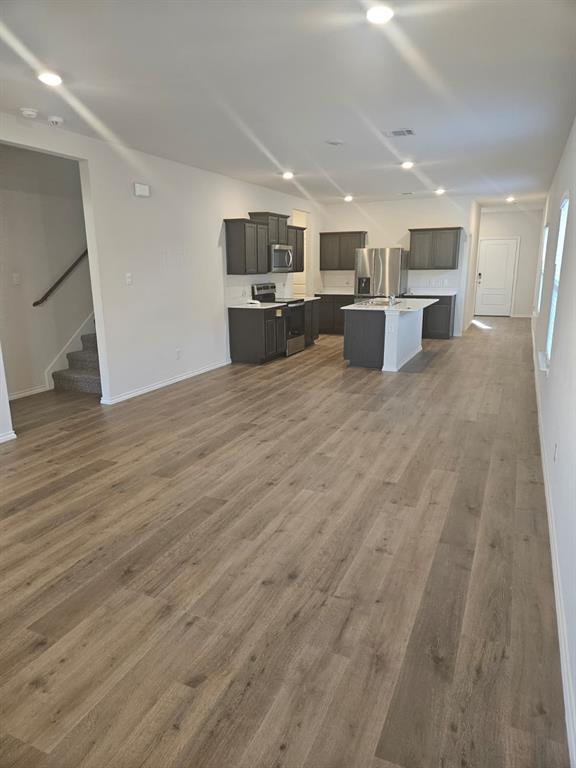 1520 Dilley Lane Forney, TX 75126 - Photo 25 of 26 a large room with kitchen view