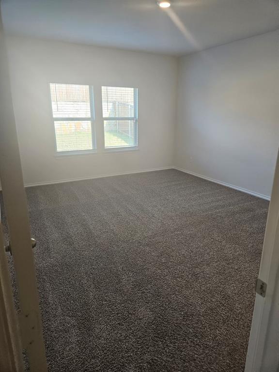 1520 Dilley Lane Forney, TX 75126 - Photo 6 of 26 an empty room with windows