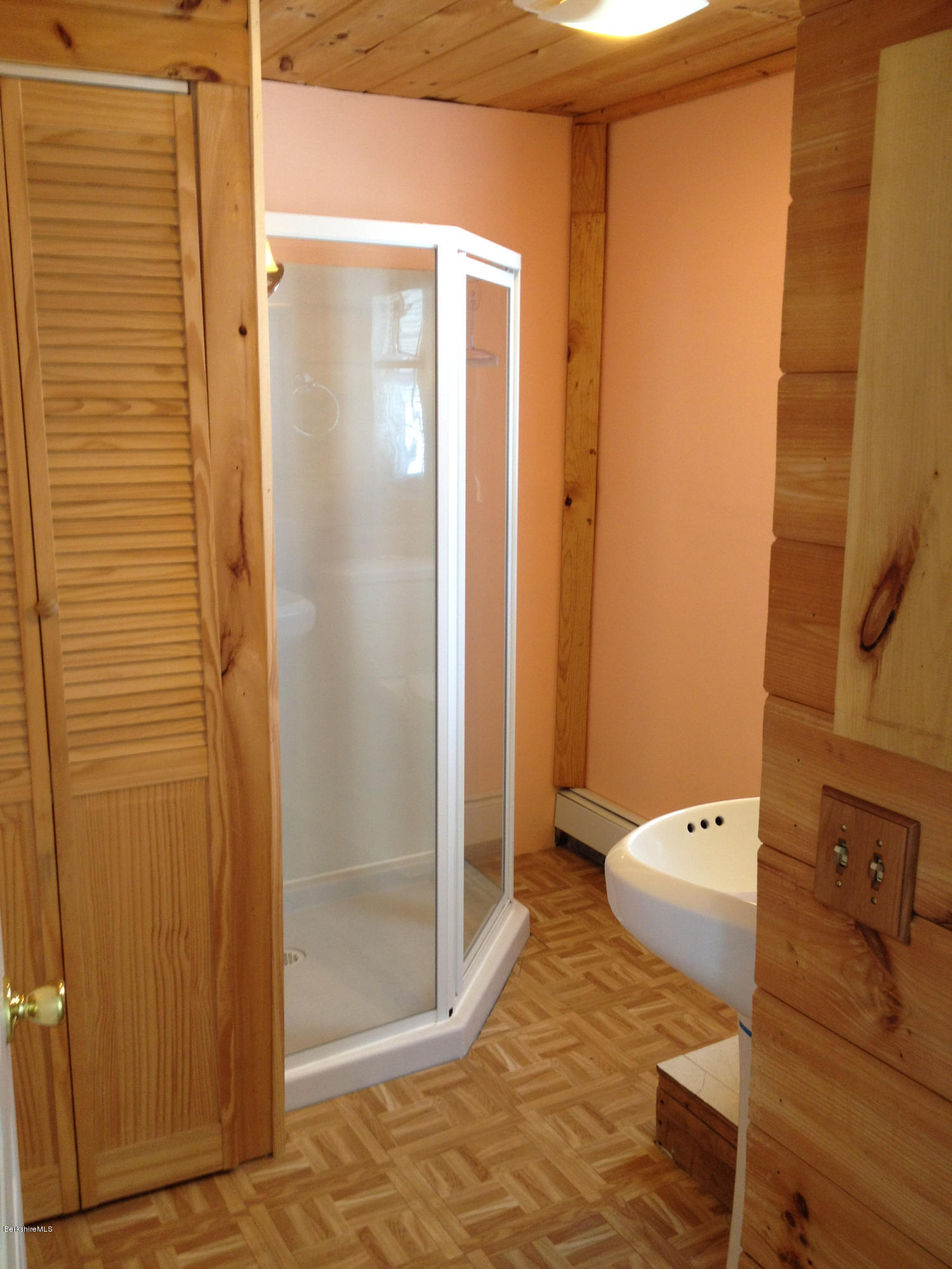 1201 River Road Clarksburg, MA 01247 - Photo 20 of 42 a bathroom with a granite countertop shower and a toilet
