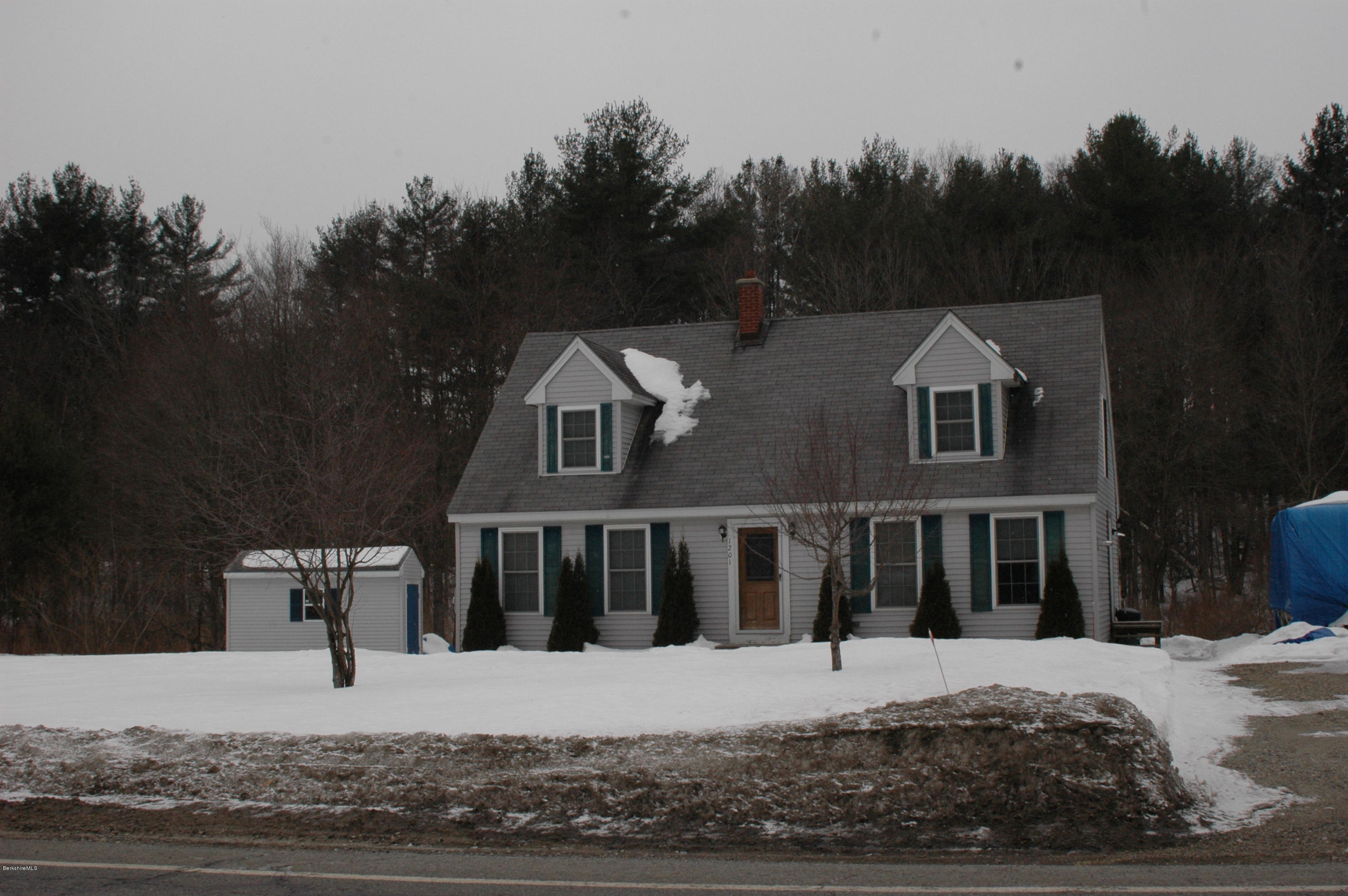 1201 River Road Clarksburg, MA 01247 - Photo 3 of 42 a view of a white house with large windows