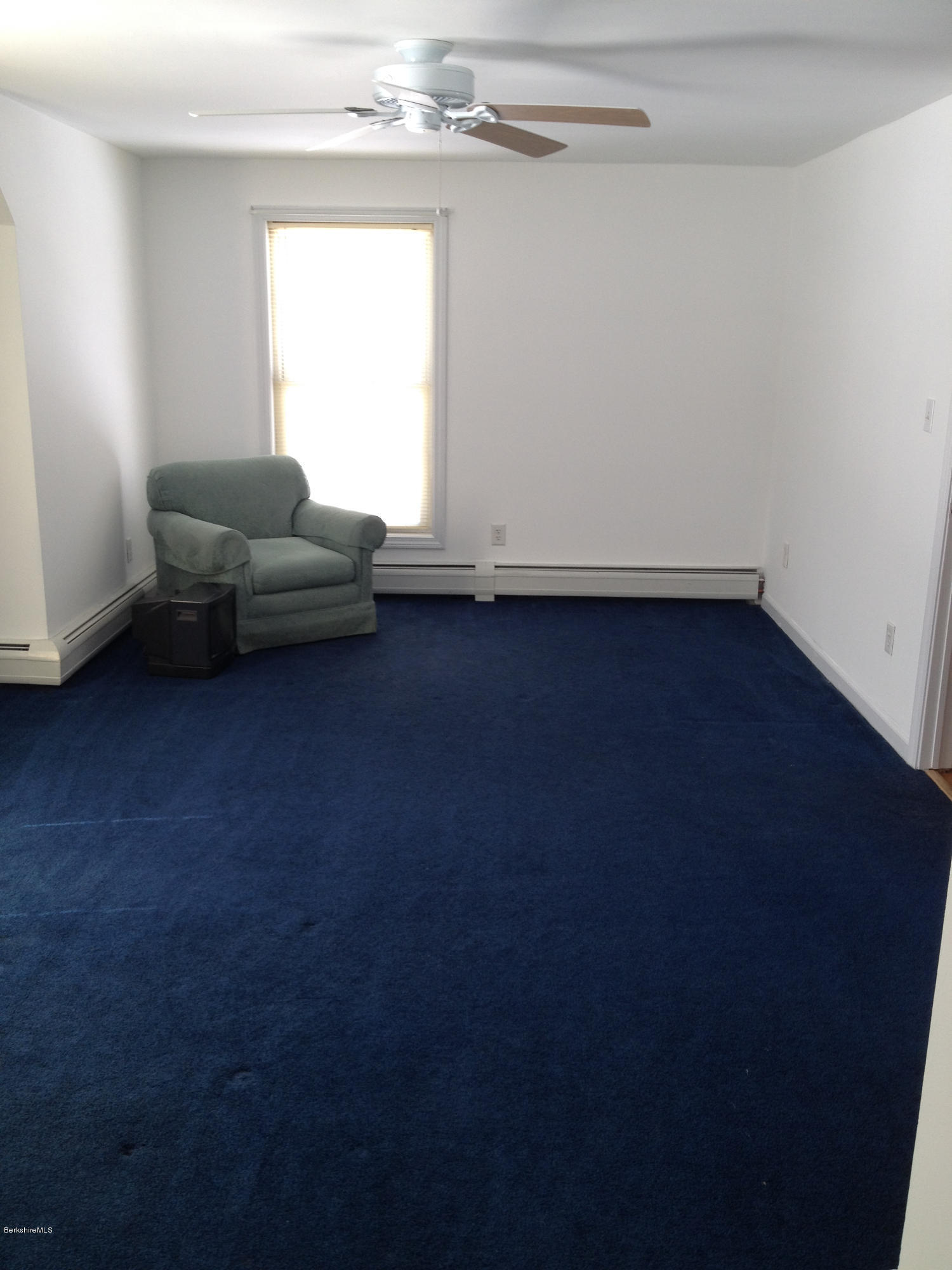1201 River Road Clarksburg, MA 01247 - Photo 22 of 42 a living room with furniture and a potted plant