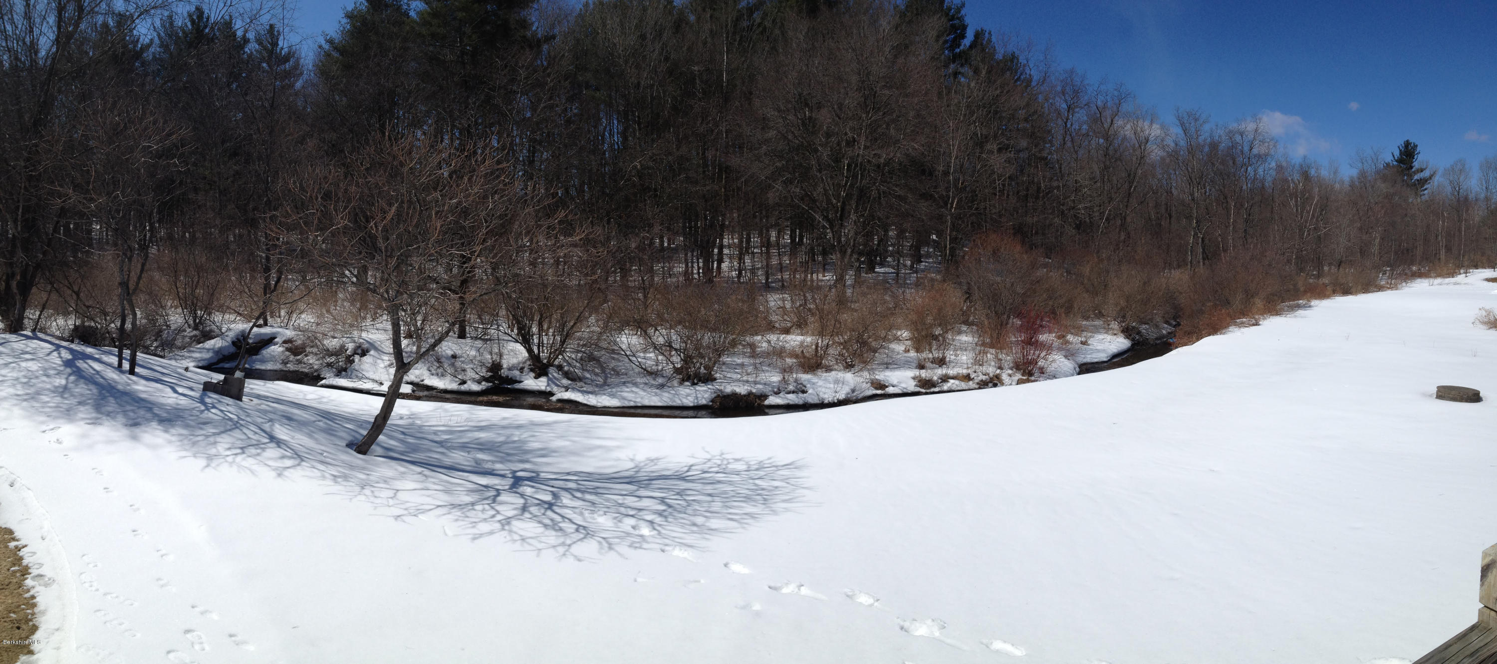 1201 River Road Clarksburg, MA 01247 - Photo 38 of 42 a view of a yard with wooden fence