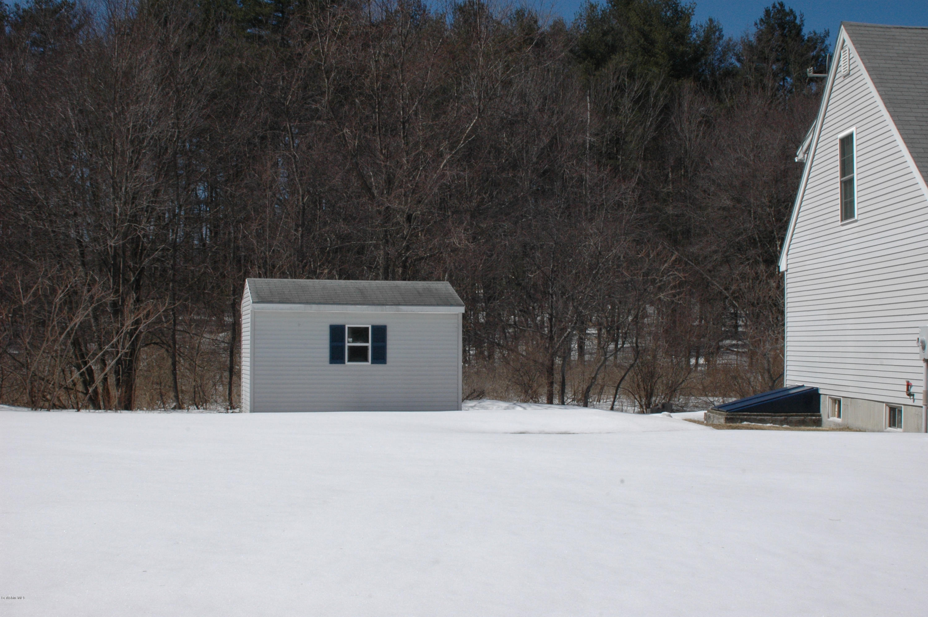 1201 River Road Clarksburg, MA 01247 - Photo 42 of 42 a view of house with yard and trees in the background