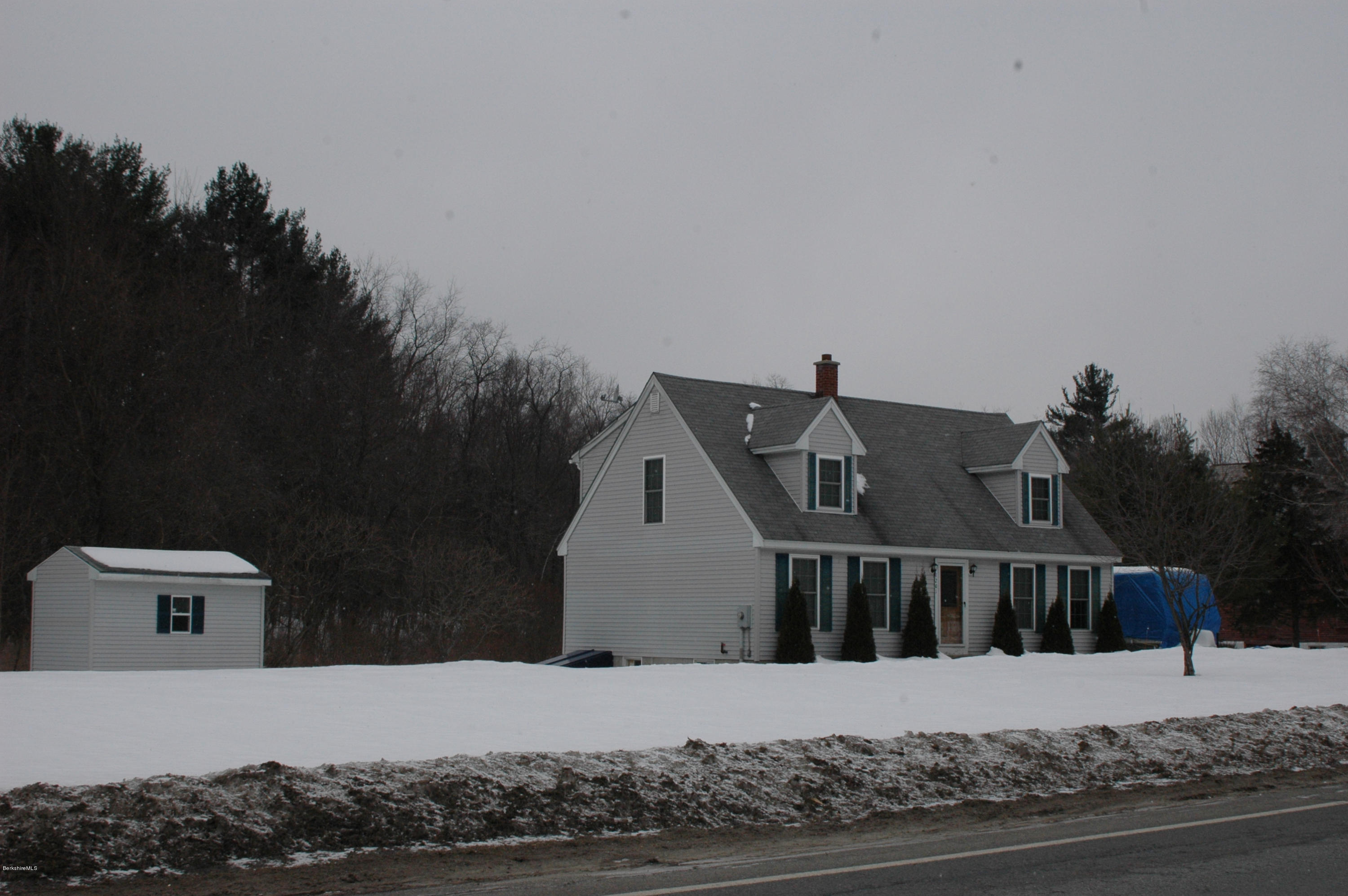1201 River Road Clarksburg, MA 01247 - Photo 7 of 42 a view of a house with a roof deck