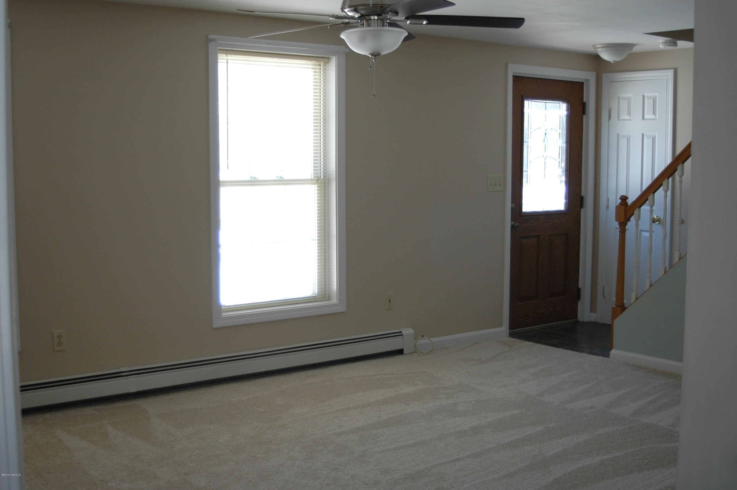 1201 River Road Clarksburg, MA 01247 - Photo 10 of 42 an empty room with windows and closet