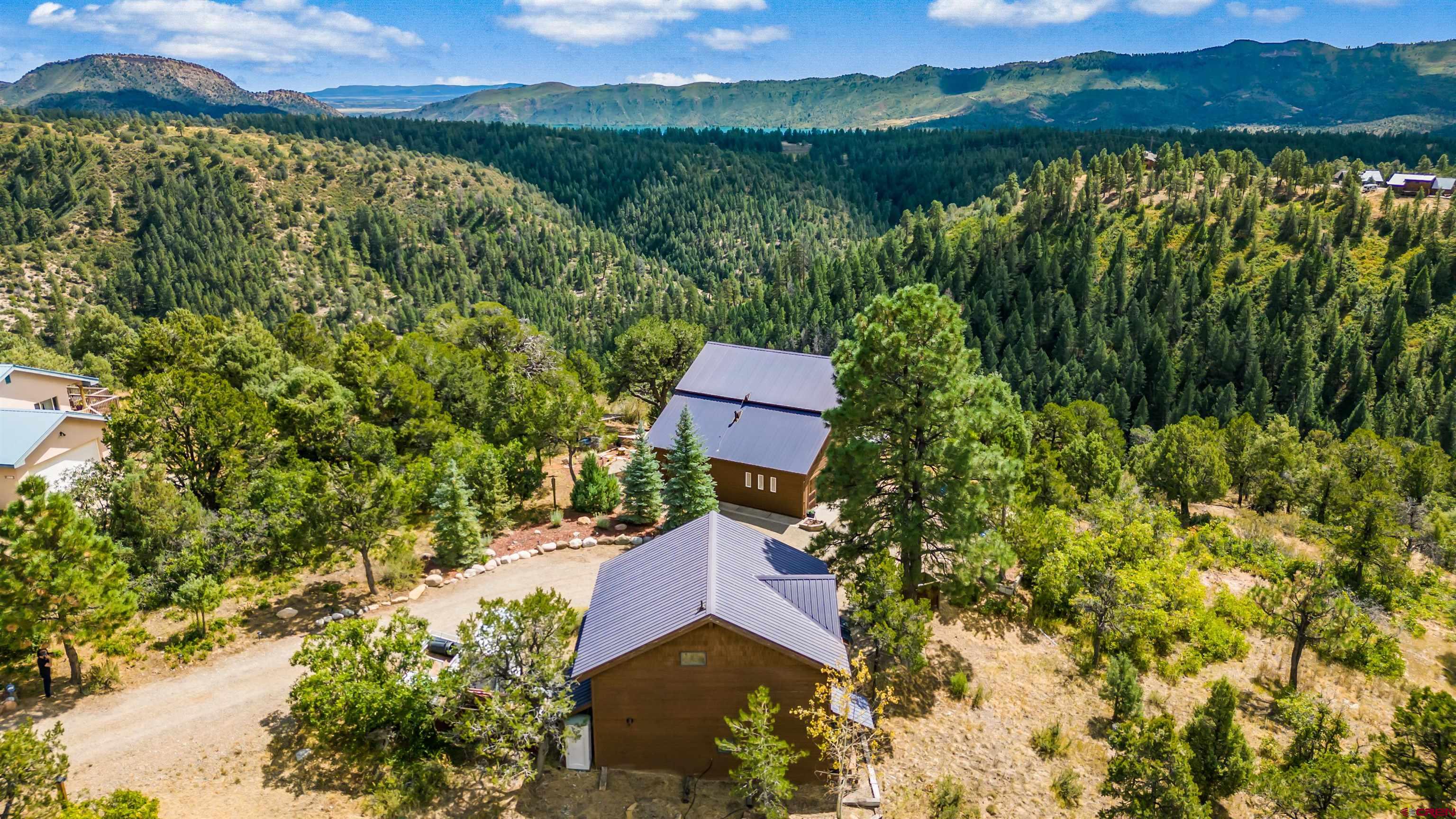 310 Far View Road Durango, CO 81303 - Photo 1 of 35 a view of a garden with a lake