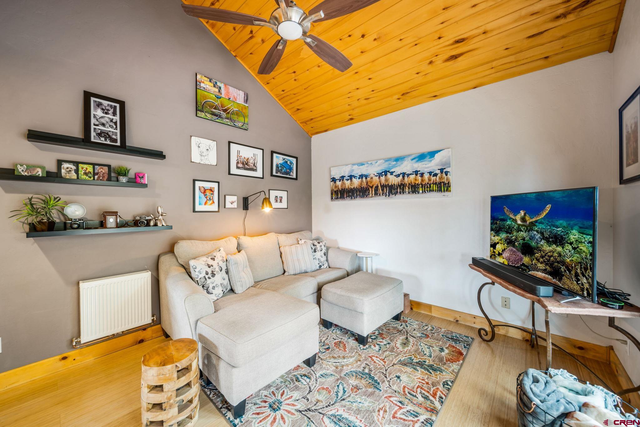 310 Far View Road Durango, CO 81303 - Photo 11 of 35 a living room with furniture and wooden floor