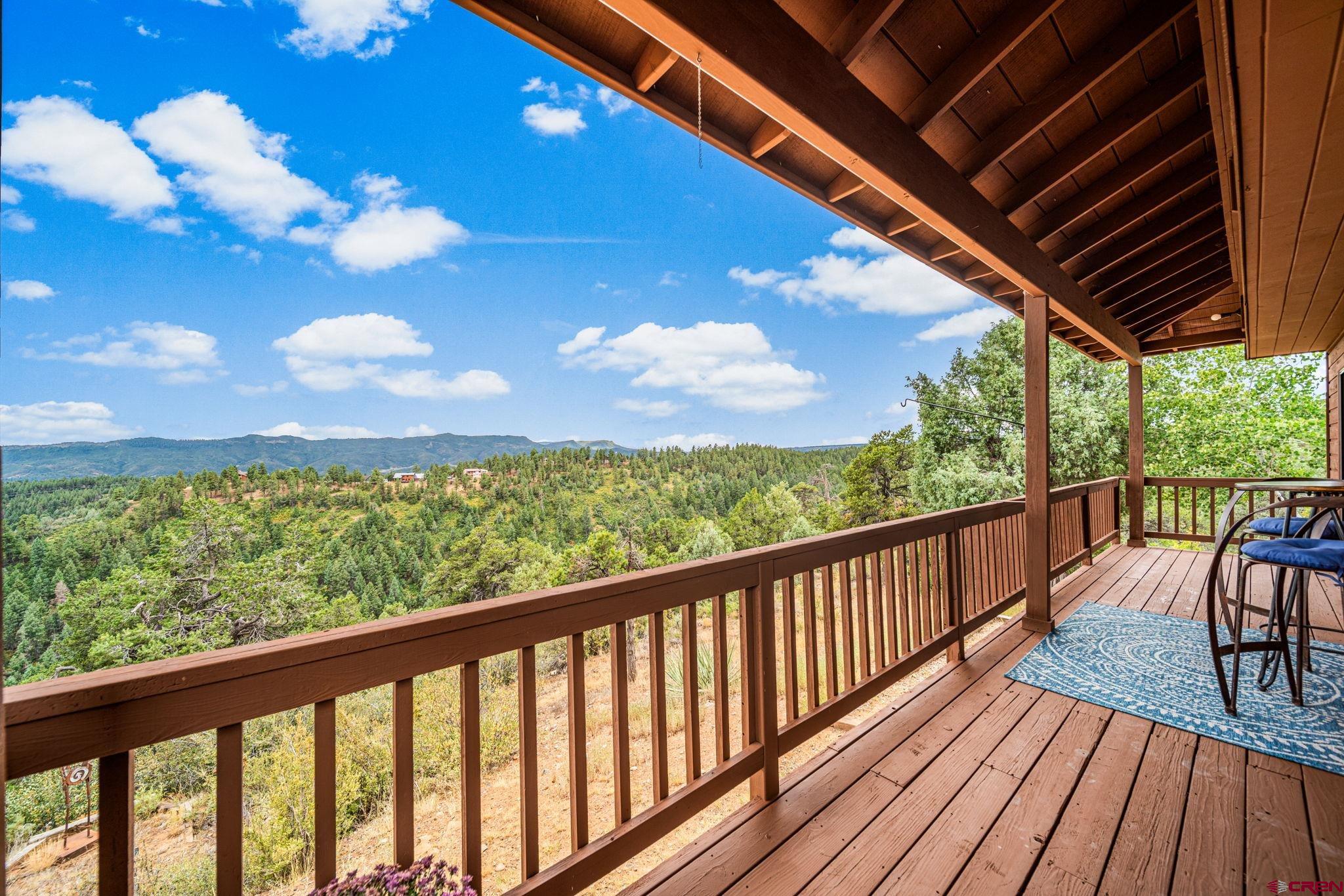 310 Far View Road Durango, CO 81303 - Photo 12 of 35 a view of a balcony with wooden floor