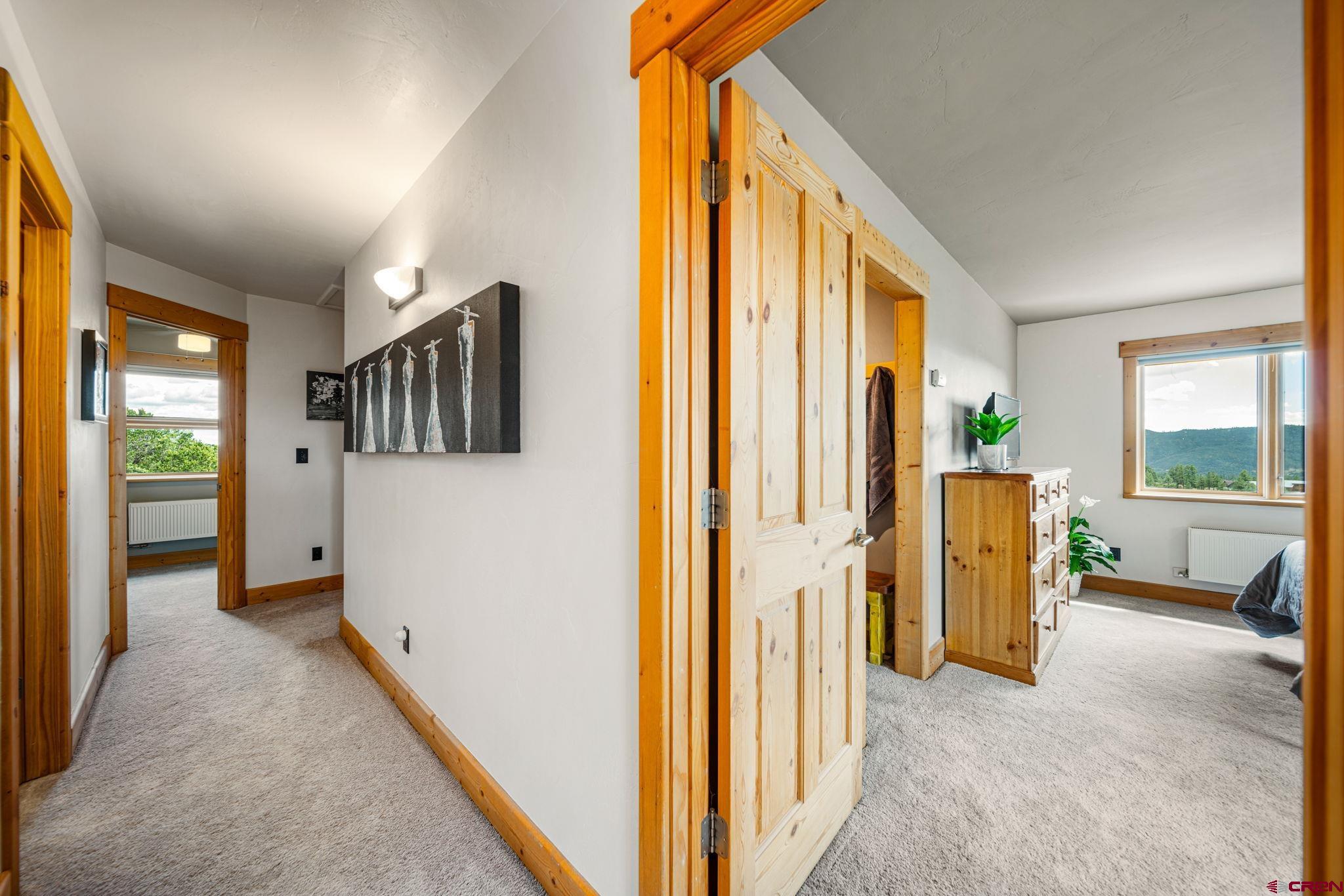 310 Far View Road Durango, CO 81303 - Photo 21 of 35 a view of a hallway with furniture and front door
