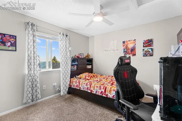 a bedroom with furniture and a bed