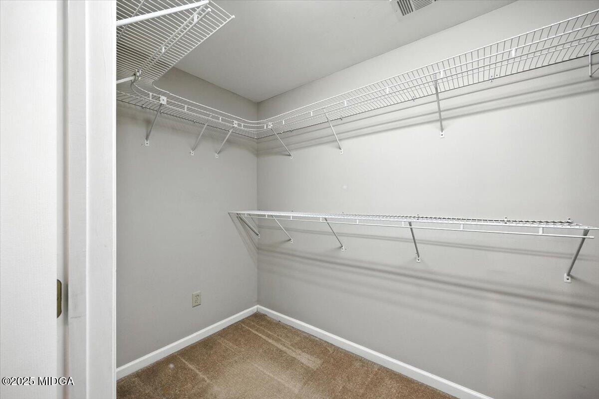 4175 Jones Road Macon, GA 31216 - Photo 14 of 40 a view of a room with racks on the wall