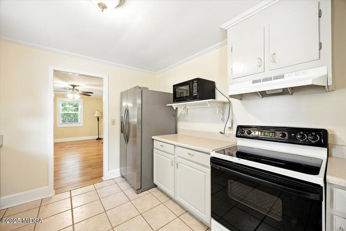 4175 Jones Road Macon, GA 31216 - Photo 24 of 40 a kitchen with stainless steel appliances granite countertop a refrigerator and a stove