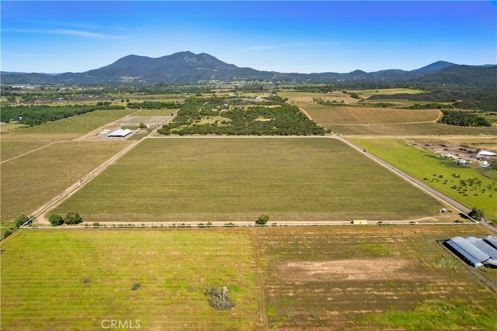 a view of an ocean and a mountain