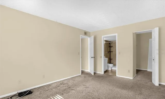 an empty room with closet