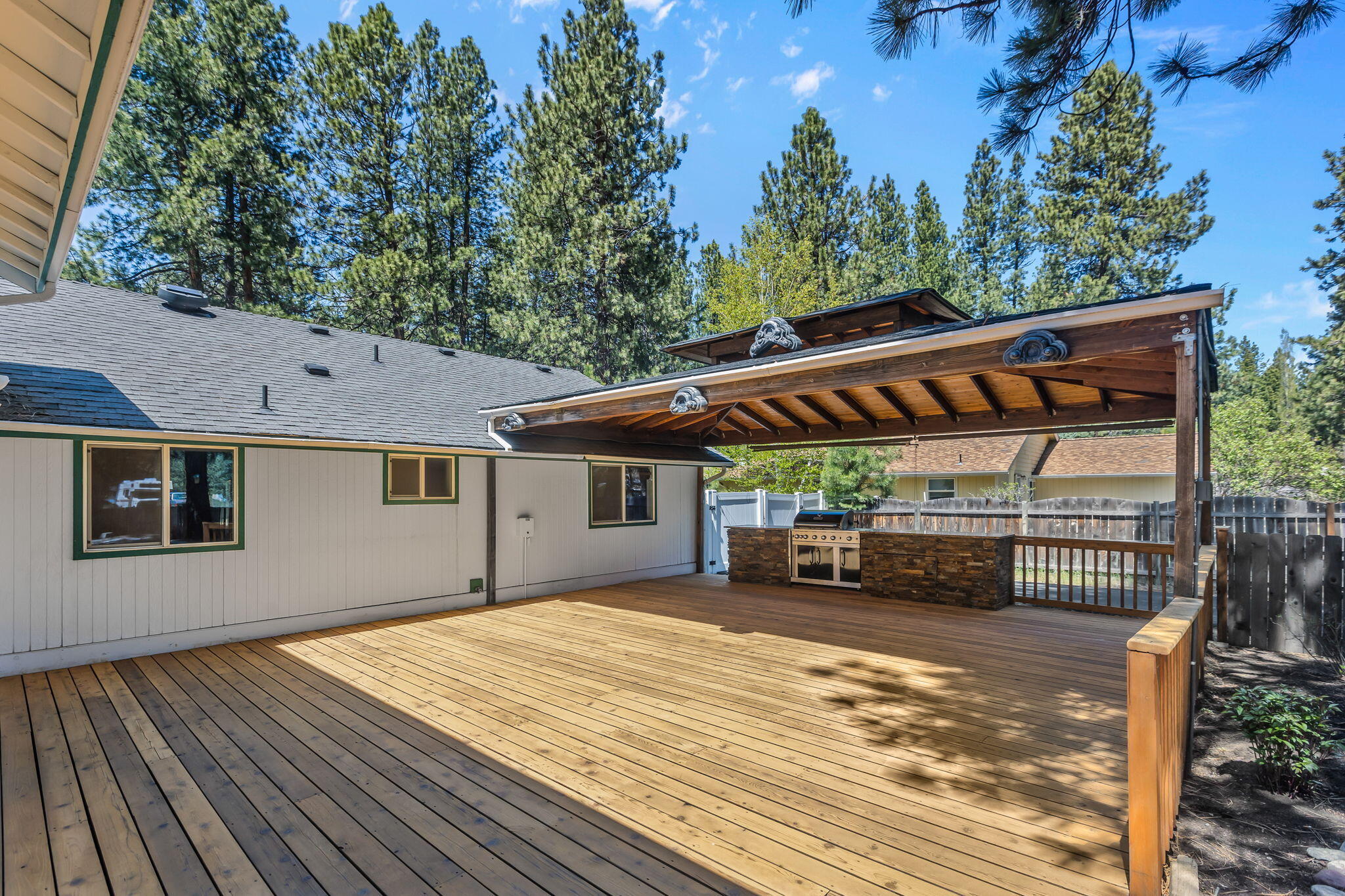 59842 Navajo Road Bend, OR 97702 - Photo 31 of 52 a view of a house with a roof deck