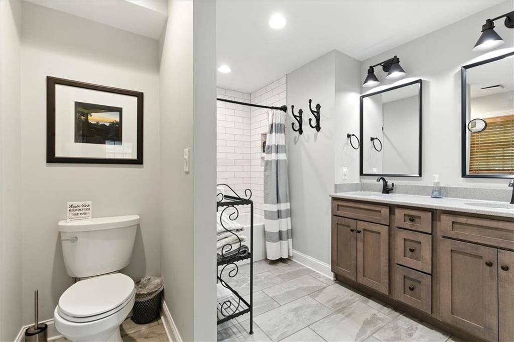 11 Brow Road Rome, GA 30165 - Photo 17 of 58 a bathroom with a toilet sink shower and mirror