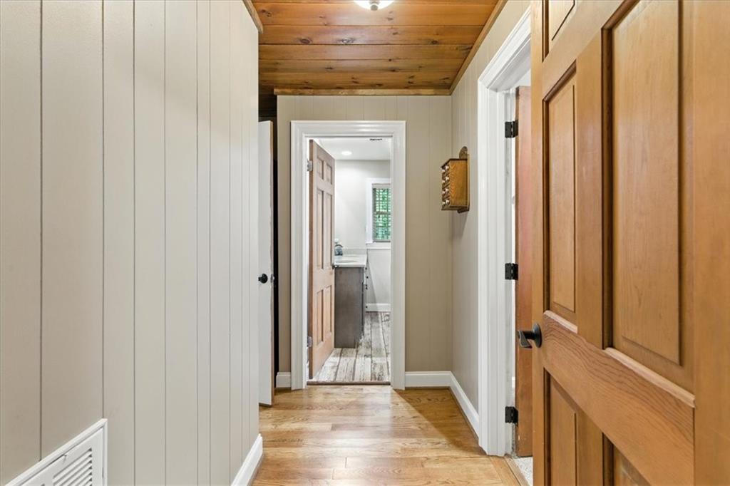 11 Brow Road Rome, GA 30165 - Photo 19 of 58 a view of a hallway with wooden floor and staircase