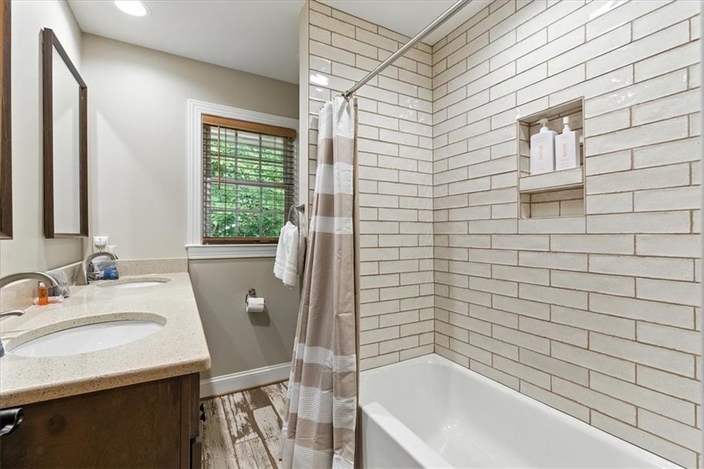 11 Brow Road Rome, GA 30165 - Photo 24 of 58 a bathroom with a bathtub and a sink