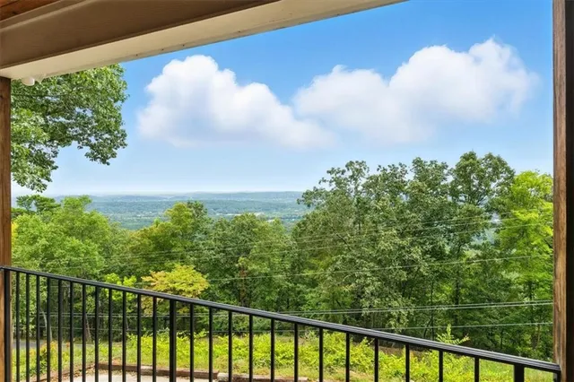 a view of kitchen island with furniture and wooden floor