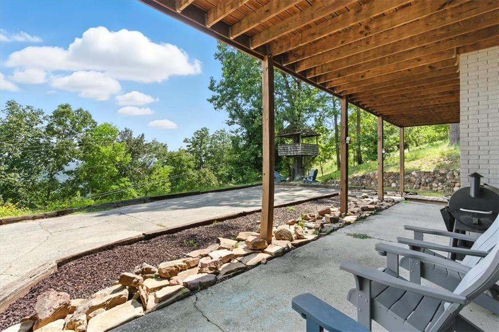 11 Brow Road Rome, GA 30165 - Photo 42 of 58 a view of a porch with furniture and garden