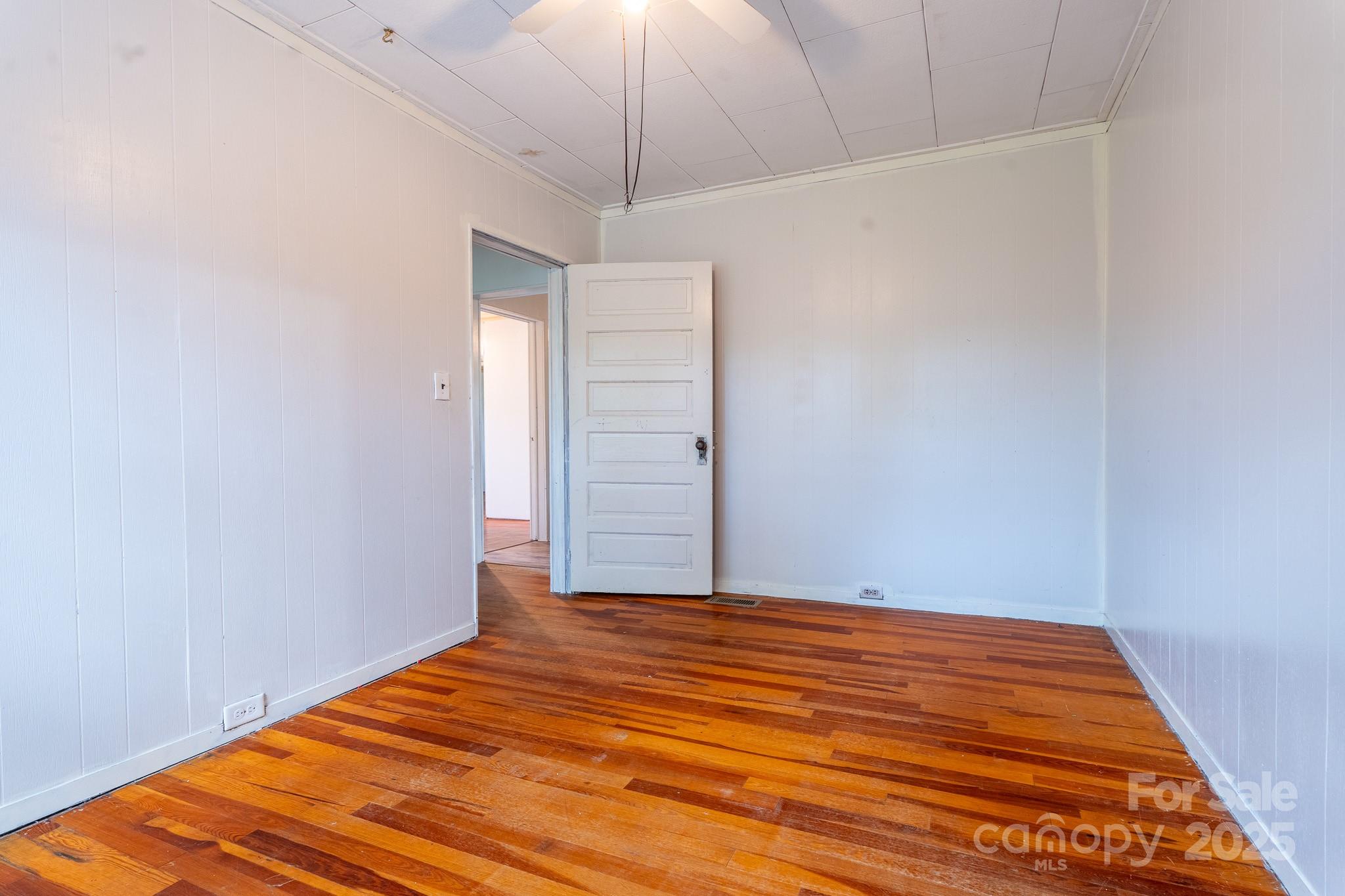 1851 Enon Road Valdese, NC 28690 - Photo 20 of 30 a view of a room with wooden floor and an entryway