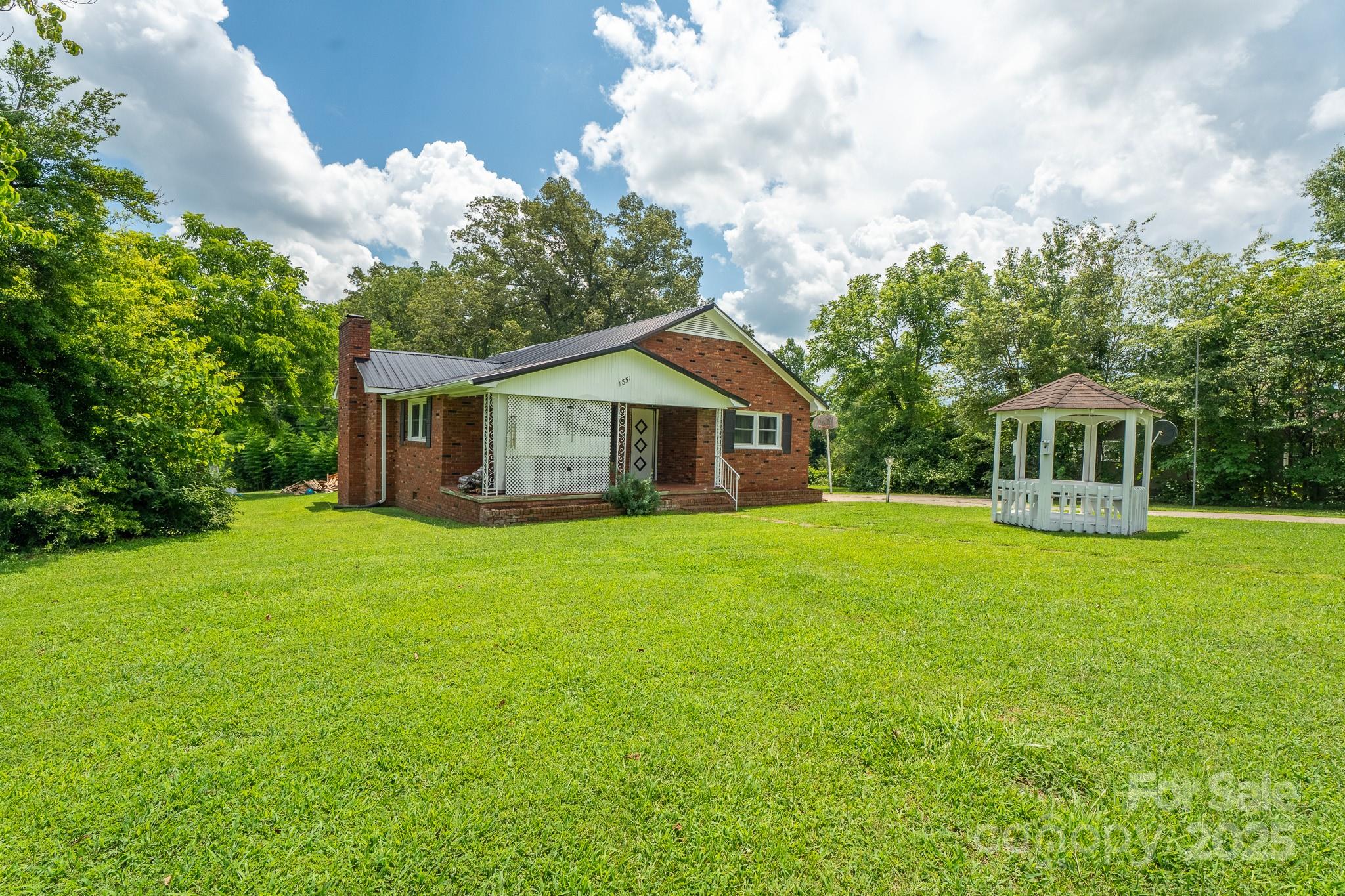 1851 Enon Road Valdese, NC 28690 - Photo 2 of 30 a front view of house with yard and green space