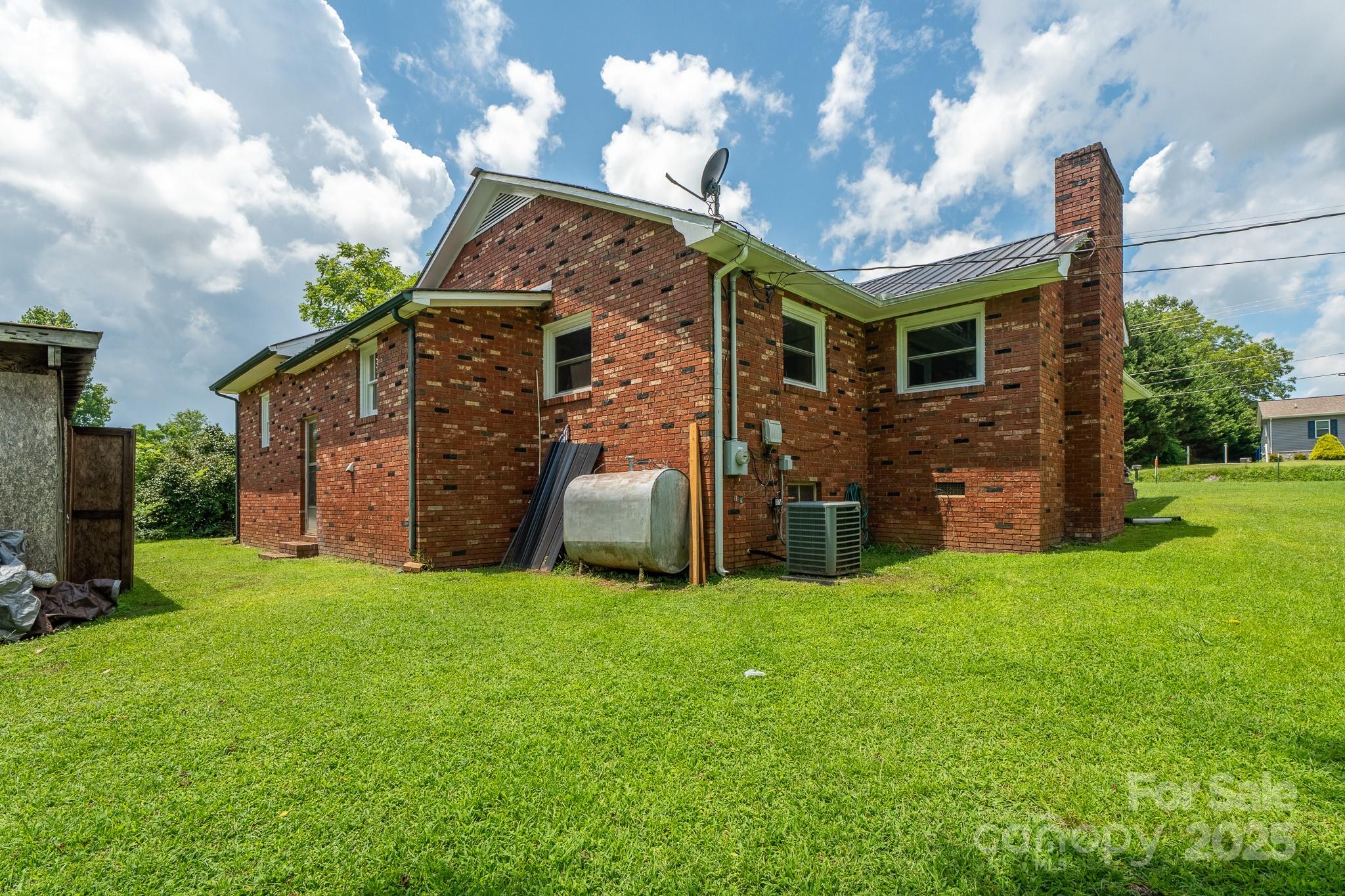1851 Enon Road Valdese, NC 28690 - Photo 24 of 30 a view of a house with a yard