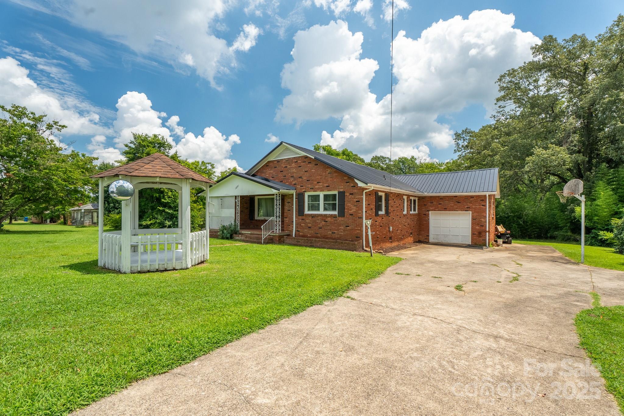1851 Enon Road Valdese, NC 28690 - Photo 3 of 30 a view of a house with a yard