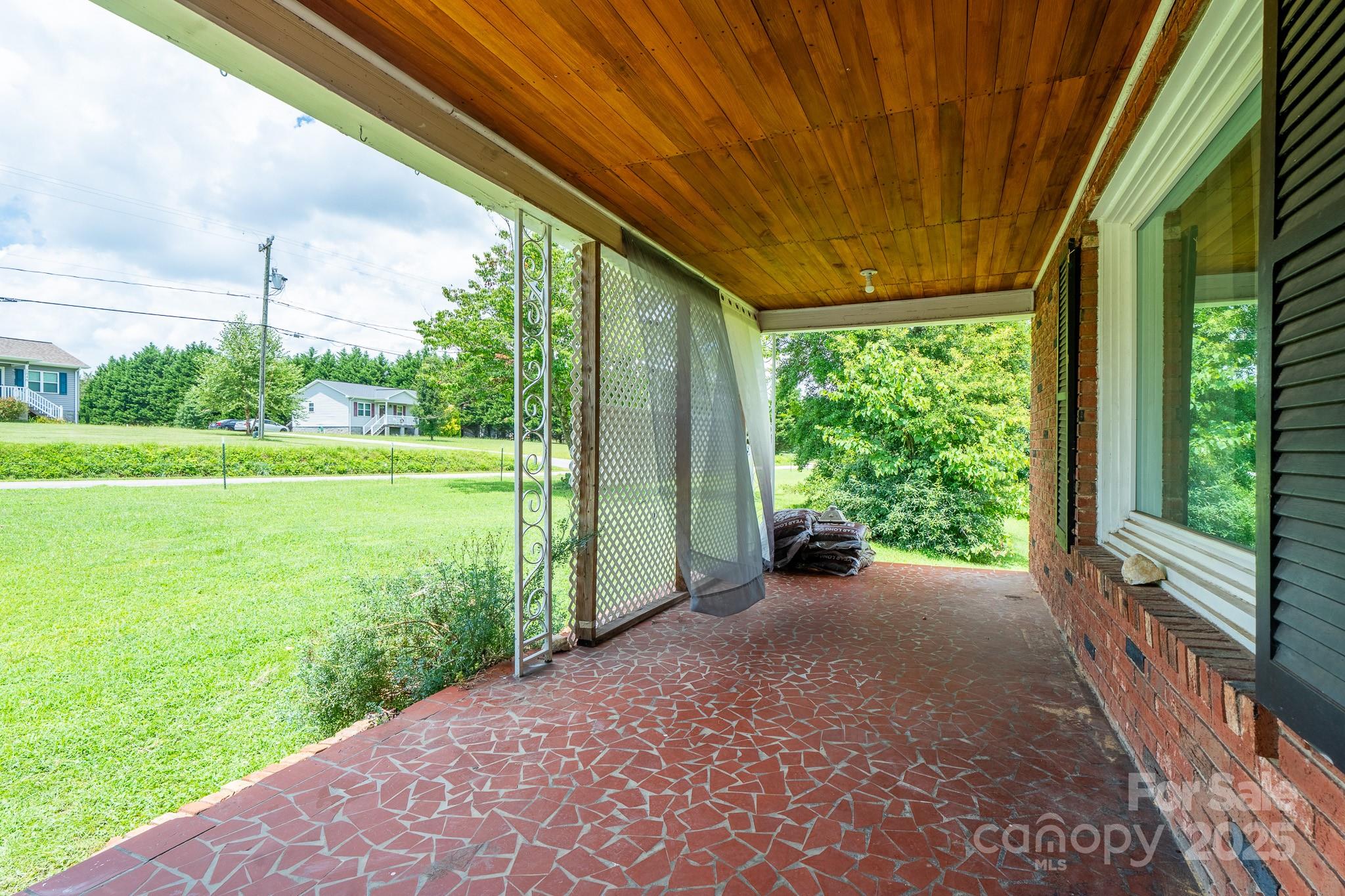 1851 Enon Road Valdese, NC 28690 - Photo 4 of 30 a view of a garden with an outdoor seating